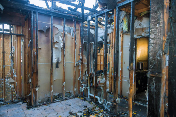 Professional Fire Damage Restoration technician working in Alma, MI